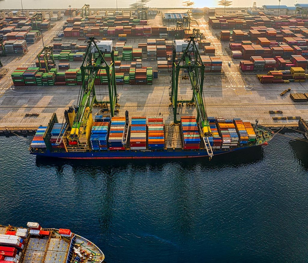 Transshipment services Malaysia – shipping containers supporting Evocom Berhad cross-border logistics
